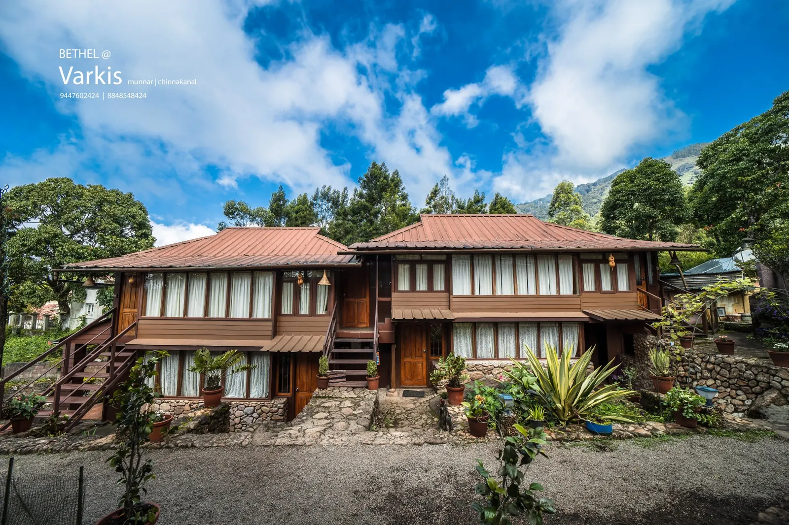Front view of Bethel Varkis wood house among the trees